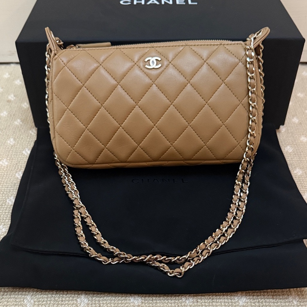 CHANEL dark beige clutch with chain